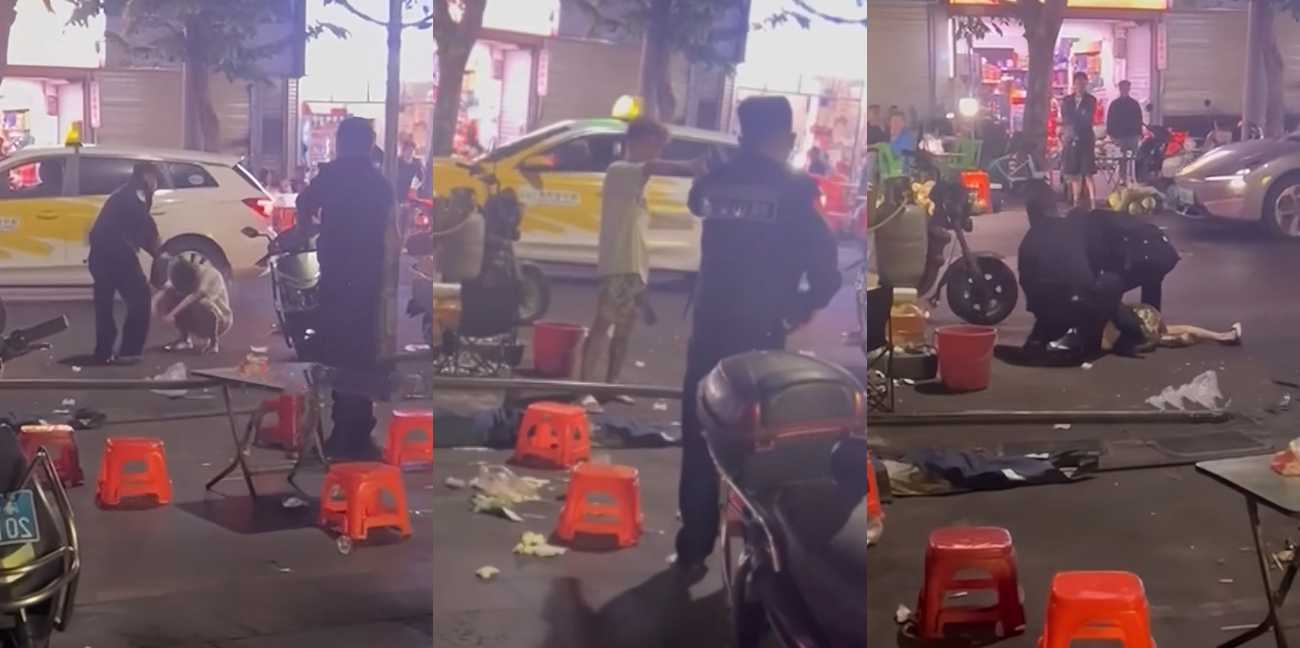 海口夜市男子持刀闹事 警察对峙现场鸣枪警告 当街按倒在地太刺激了