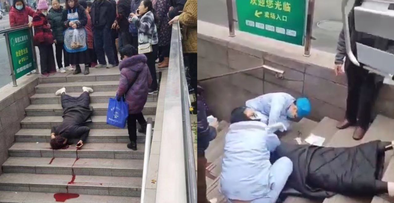 黑衣妹子走路玩手机不看路 在楼梯上摔死了 真倒霉啊 路人上前围观