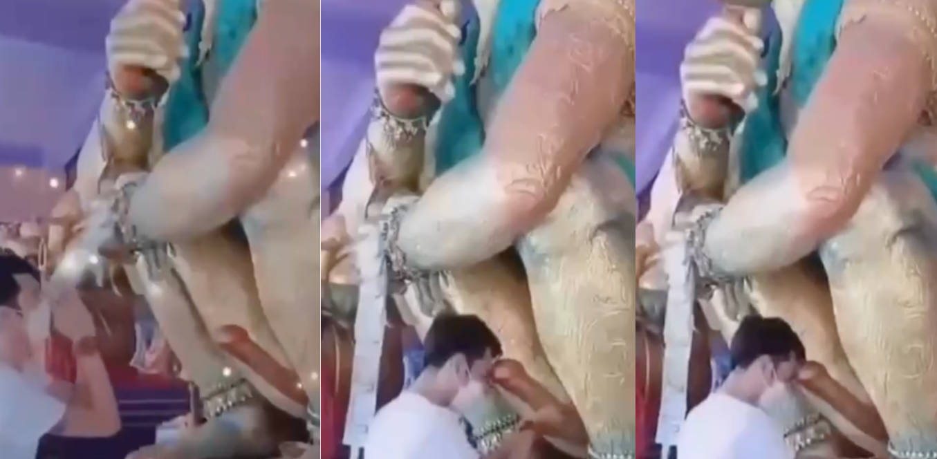 男子头顶神像生殖器拜神 尺寸与身材严重不协调 新奇视频引热议