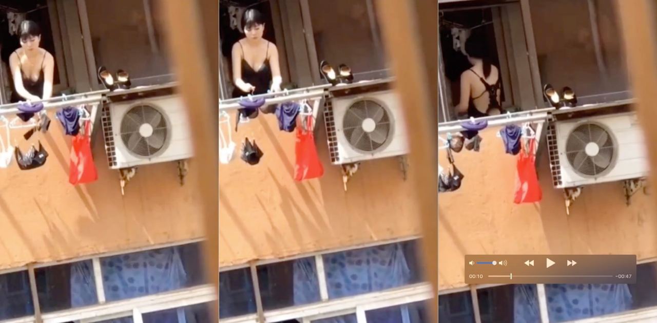 偷拍，隔壁住的是潘金莲嘛？情趣开背睡衣阳台大方展示傲人身材