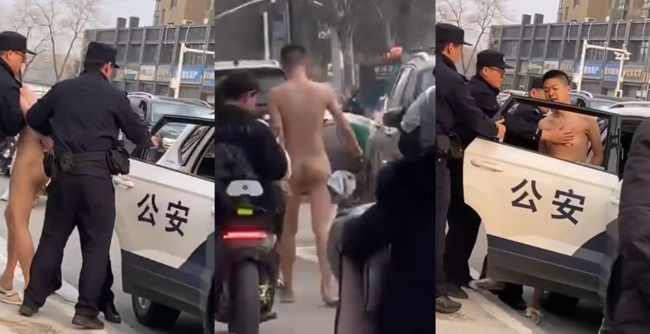 江苏建邺 庐山路附近一男子脱光衣服暴走 赤身裸体的走在大街上