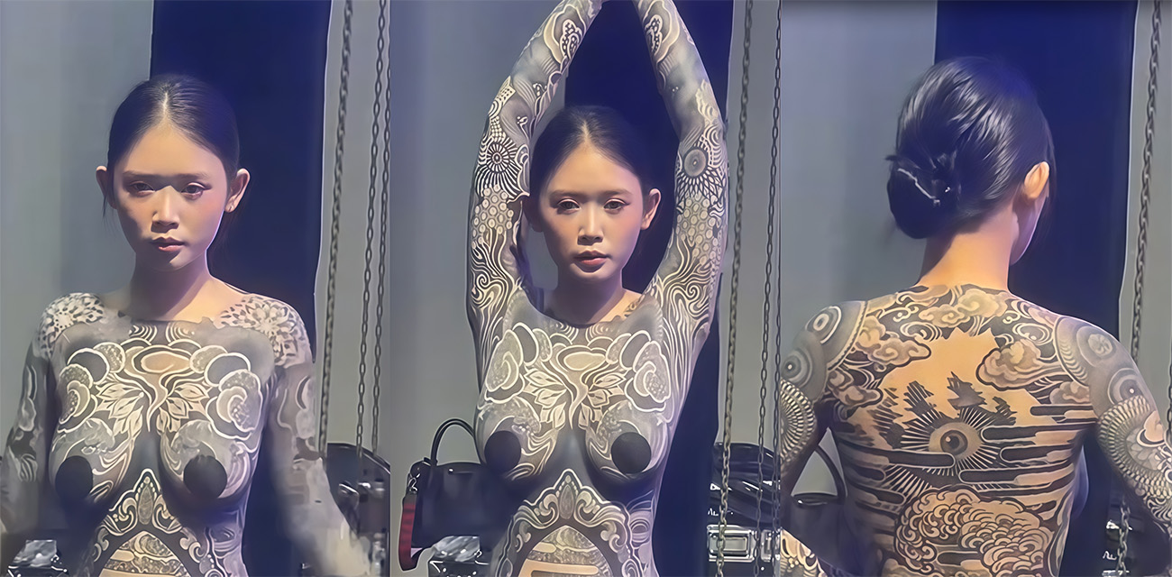 山东纹身展览通体纹身的越南女模 奶贴都没必要 干脆纹满全身多好