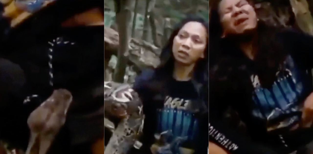 女子大胆拿着巨蟒当众展示 众人围观笑成一片 突然蟒蛇凶猛咬中下体痛到表情扭曲惨叫