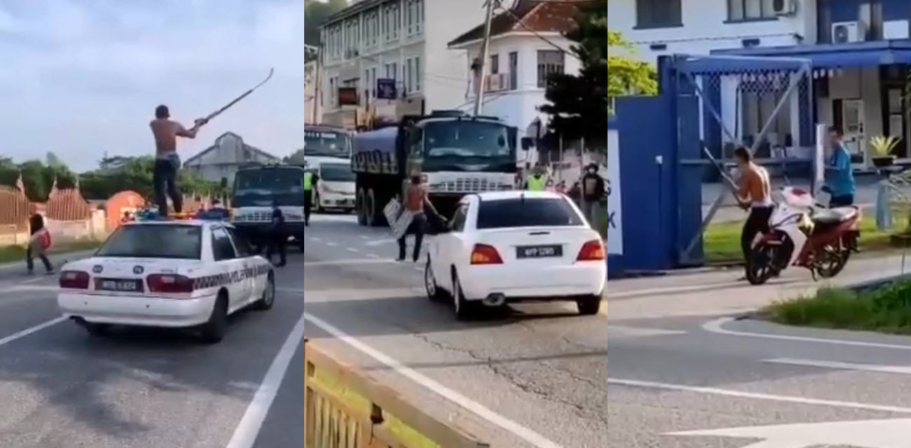 马来西亚惊现一名疯子大闹警局 手持武器站在警车上疯狂叫嚣惊呆众人