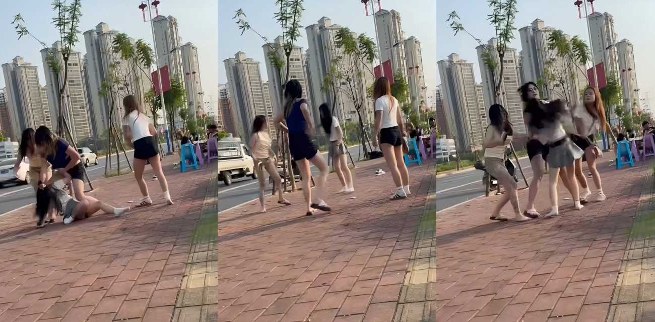 大白天盲道上啤酒瓶开砸 五女鞋底互抽 男的坐着看戏不动弹