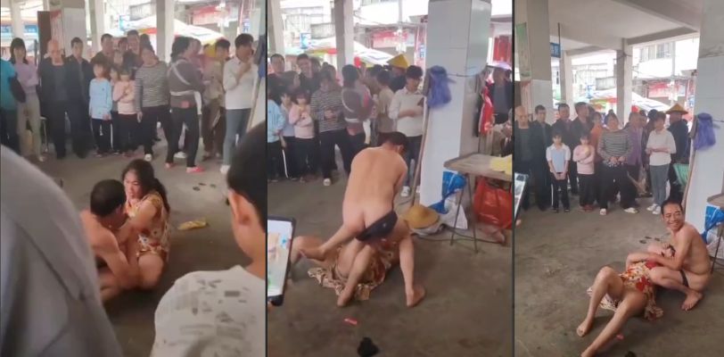 男女街头打架越打衣服越少 人妻裙底风光都不顾了 把男人的裤衩子给扯了下来