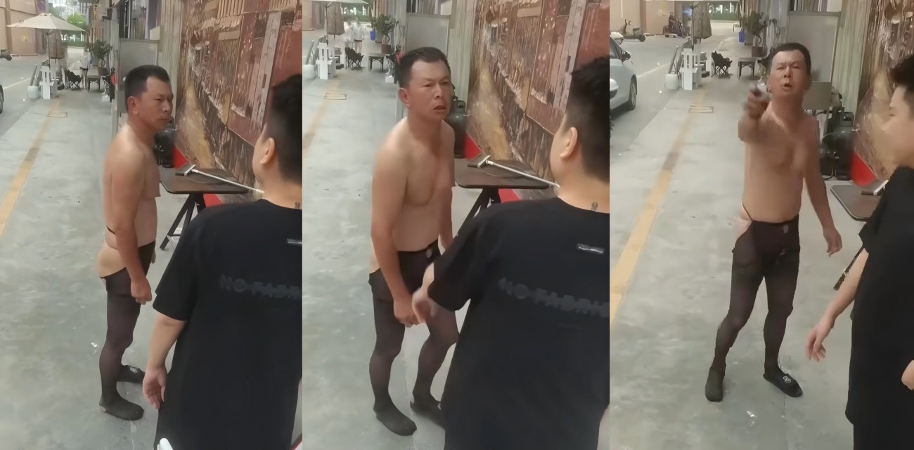 中年大叔穿黑丝袜吃饭被轰 店门口大吵还掉手机 围观群众看傻眼