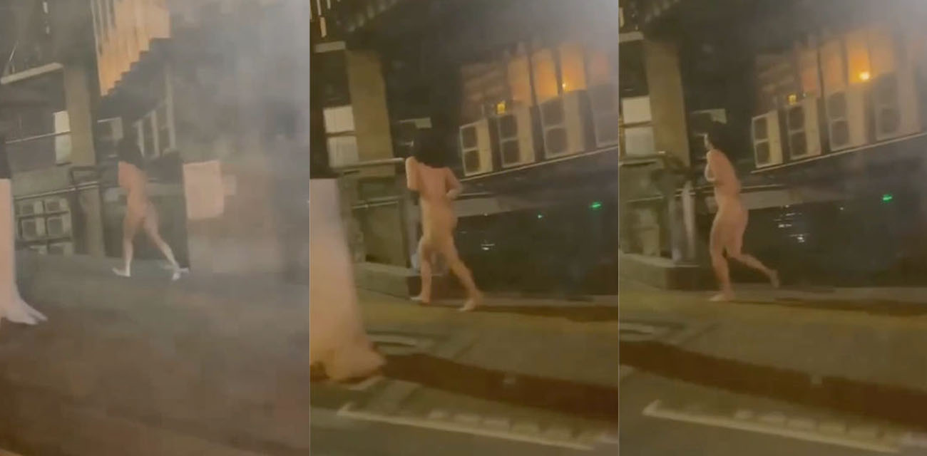 郑州闹市区二七广场惊现裸奔女 引得大量群众围观 又是主人的任务?