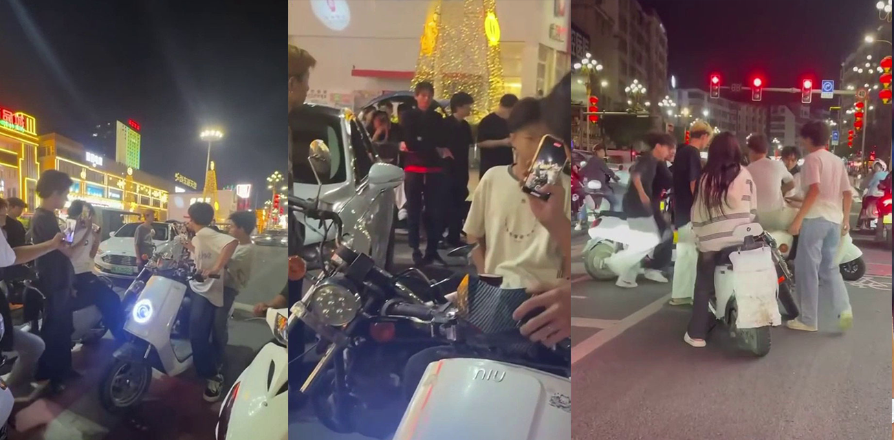精神小伙持刀威胁众人跪下 街头冲突瞬间升级激烈对峙