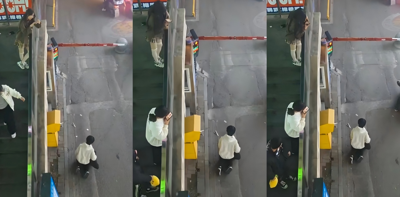 吉林四平街头大戏 男子被女友调教跪地移动 围观群众手机拍不停
