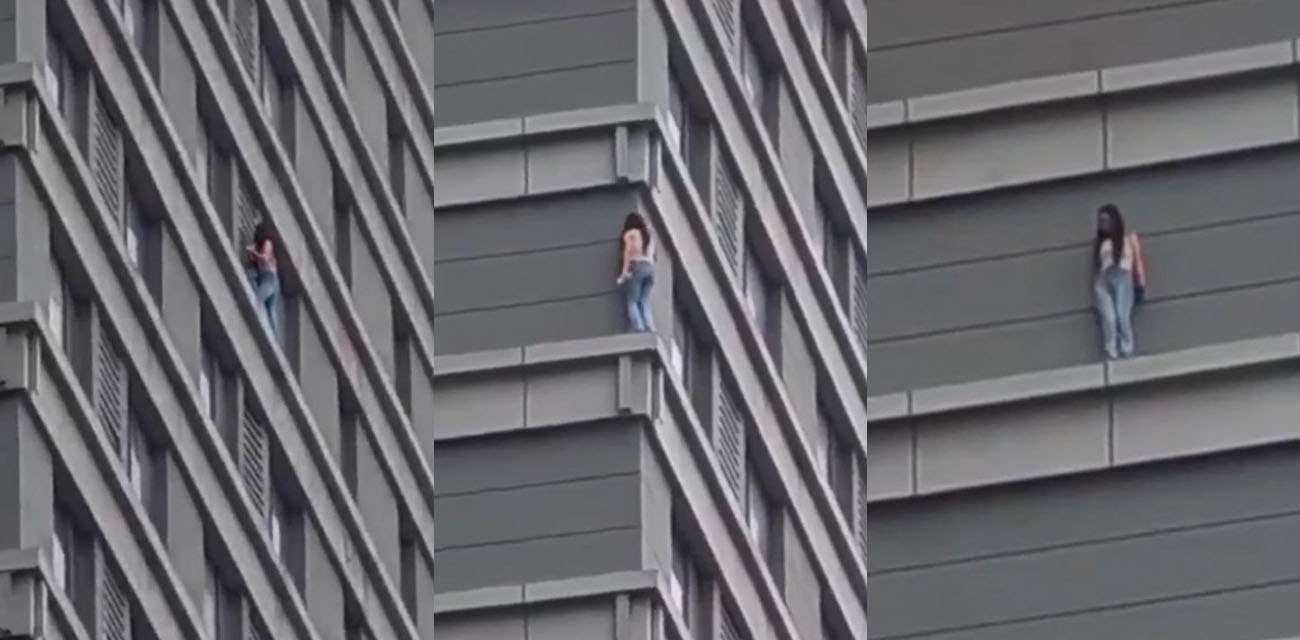 某地一高楼惊现女子凌空漫步 这玩得也太大了 生怕她一不注意就掉下来