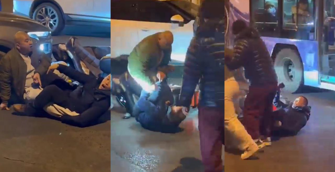 北京一辆轿车与摩托发生车祸 摩托车主赔了轿车车主十五万 因为轿车车主在线挨打不还手
