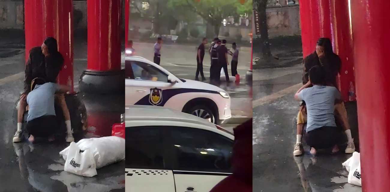 雨中五指山三月三广场小情侣旁若无人拥吻缠绵 男的竟钻进了女的裙底