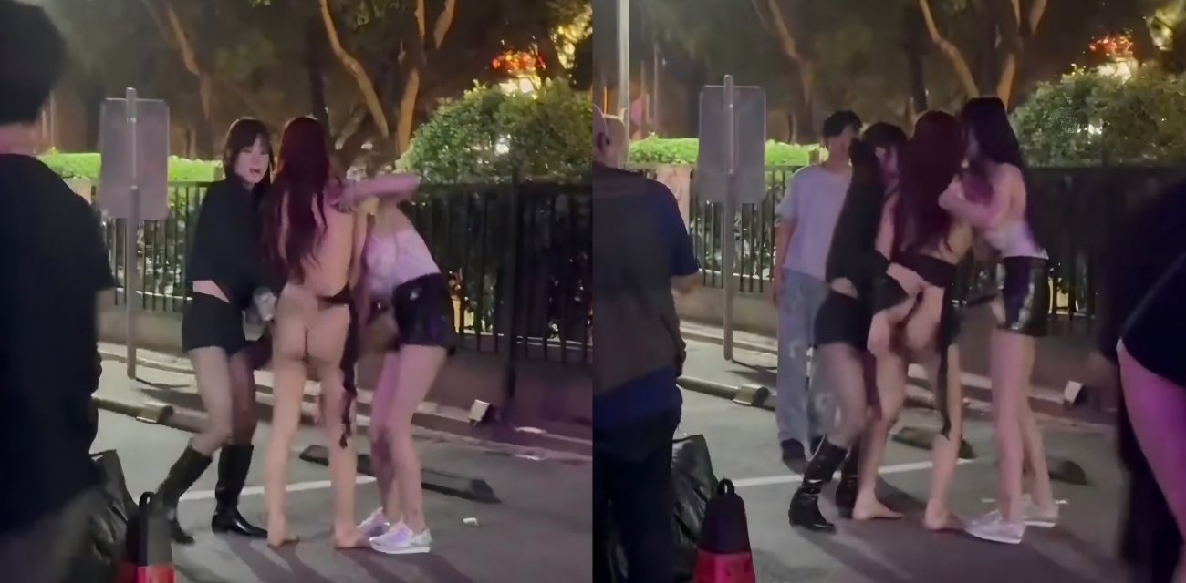 夜里公园停车场闹麻了 姐妹脱衣露屁股 遮都遮不住 路人看呆了