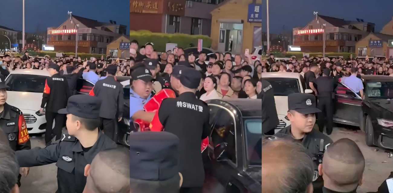 迁安南市场惊爆 领导奥迪车内私会情人 原配抓包引万人围观 特警护送场面震撼