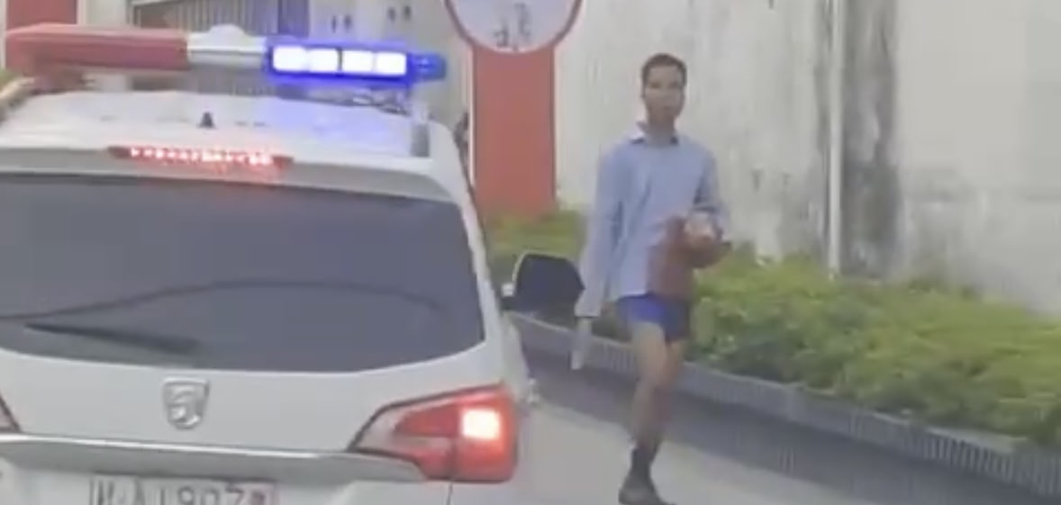 广西南宁杀人砍头提头上街