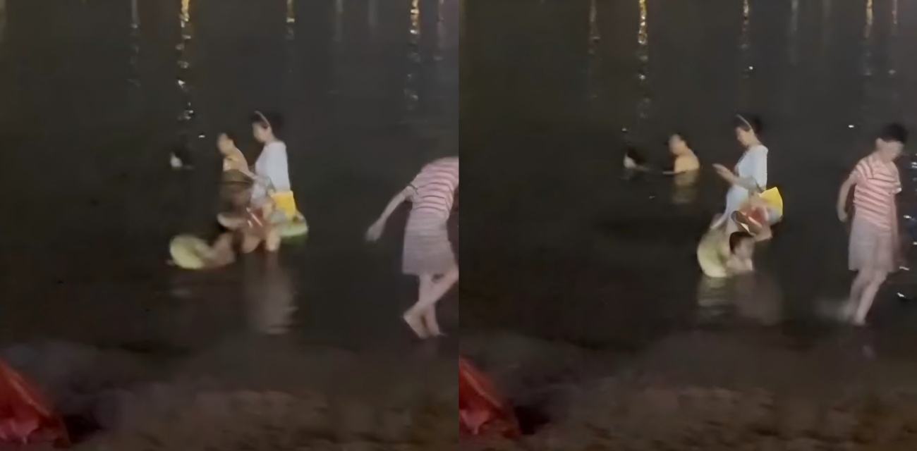 夏夜海边炸眼 男女海水里老汉推车 宝妈就在旁边 岸上全拍下来了