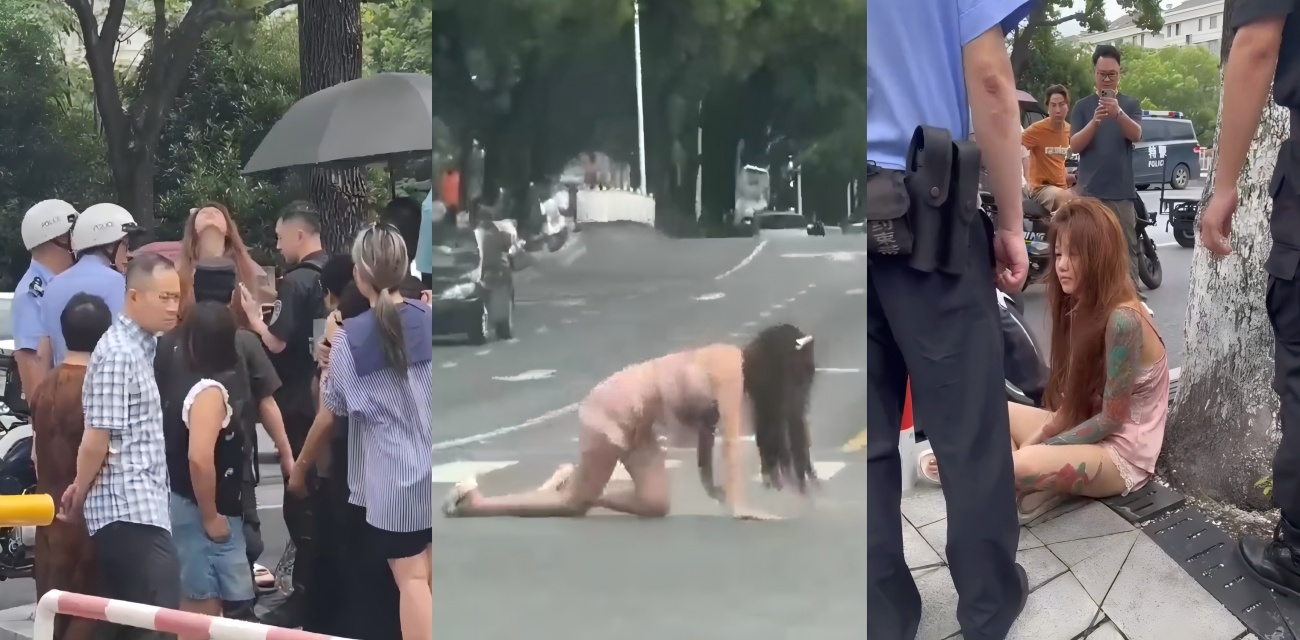 大中午美女马路上爬着打滚 眼神空洞吓傻众人 被巡警带走