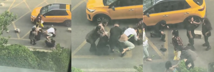 停车场男女混战被偷拍曝光 黑衣男打不过就偷袭女生典型欺软怕硬