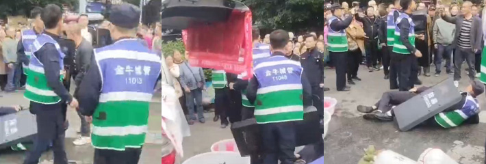 四川成都金牛区一卖鱼商贩与城管发生冲突，多名城管殴打小贩，现场情况激烈！