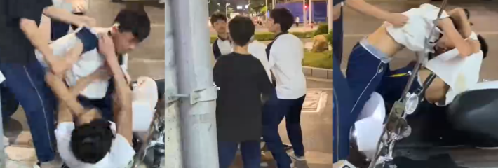 学生放学打起来了 还有点分寸 拿了铁圈不打人砸车 纠纷群架拉不开 年轻人火气爆棚！