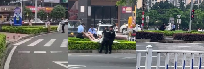 天气太热 一女子裸体出街被男警合力抬走 莫不是精神病！