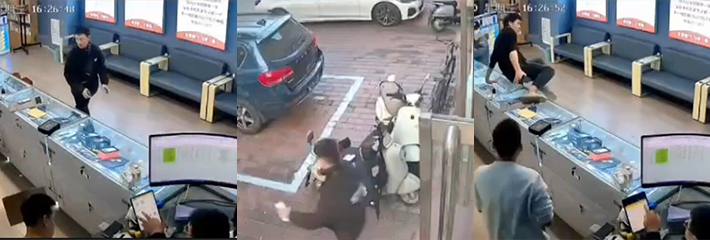 河南手机店一小伙偷了两部手机逃跑 眼尖的店员直接追上去 小偷下一秒就被逮了 没事要多运动啊！