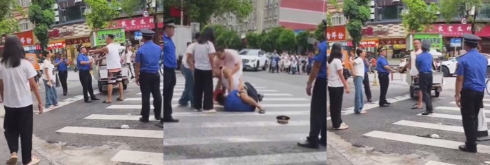 城管执法街头 遇狠人被打倒地 路边摊贩人高马大正面硬刚