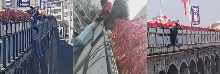湖南娄底市新化县 一女子资江桥上欲轻生 路人特警实时上演生死大营救！