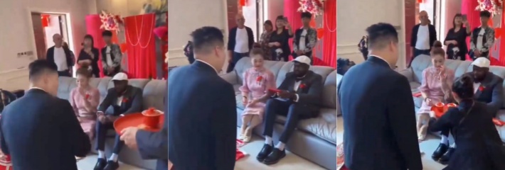离了个大谱！男子结婚给父母敬茶时坐了个黑老哥 还是这老熟妇会玩啊 老黑还挺腼腆