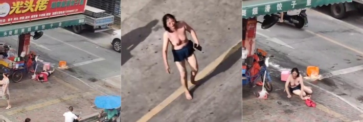 广州光头佬饺子皇楼下 一女子失控当众脱衣服打滚骂人 这是受了什么刺激！