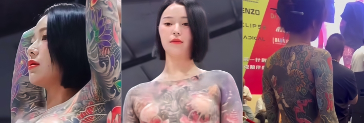 2025合肥纹身展 女生组选手表演才艺时 黑色纱衣女子直接跨坐在男评委大腿上 动作暧昧十足！