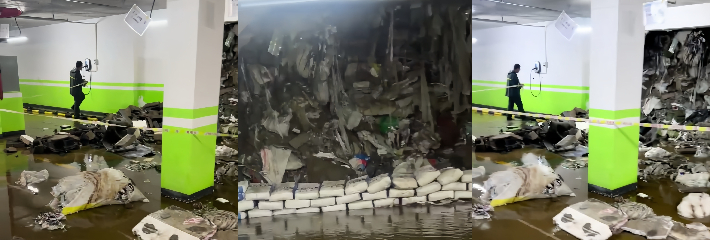 沈阳荣盛和悦名邸 地下车库墙体坍塌 暴雨冲出大量垃圾引发质量质疑