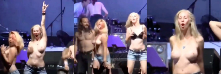 不得不说国外的各种活动都是极其开放的 音乐会上女DJ裸露奶子在舞台上甩奶嗨皮！