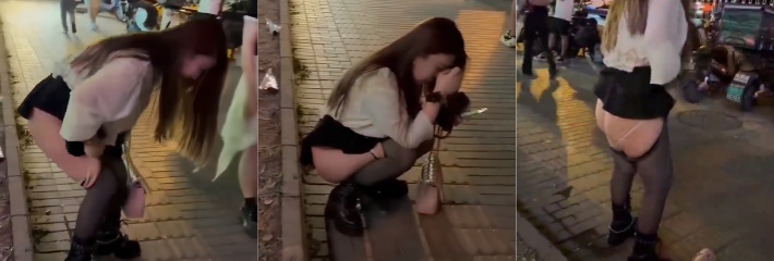 醉酒美女街头尿尿 被全程拍摄记录 美腿翘臀一览无余 这波给摄影师加鸡腿！