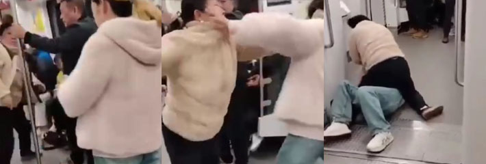 江西南昌地铁上凶猛大妈与一女子肢体冲突将女子打得满头鲜血 大妈真是猛如虎把劝架的也打趴下了！