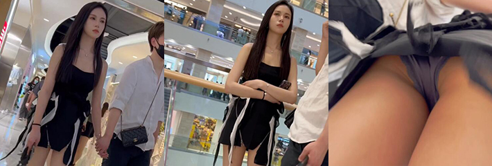KFC系列 大神抄底模特身材的长腿美女 裙底被拍毫不知情 一脸不开心 看来男友没有喂饱啊！
