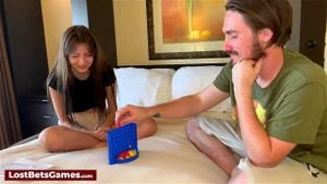A sexy brunette rides his cock after a strip game of Connect 4 on the bed: Porn - 经典欧美