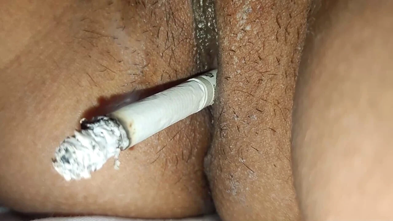 Rajasthani  Neha  Pussy of the Smokes cigarette and gets  fingers inserted in her pussy