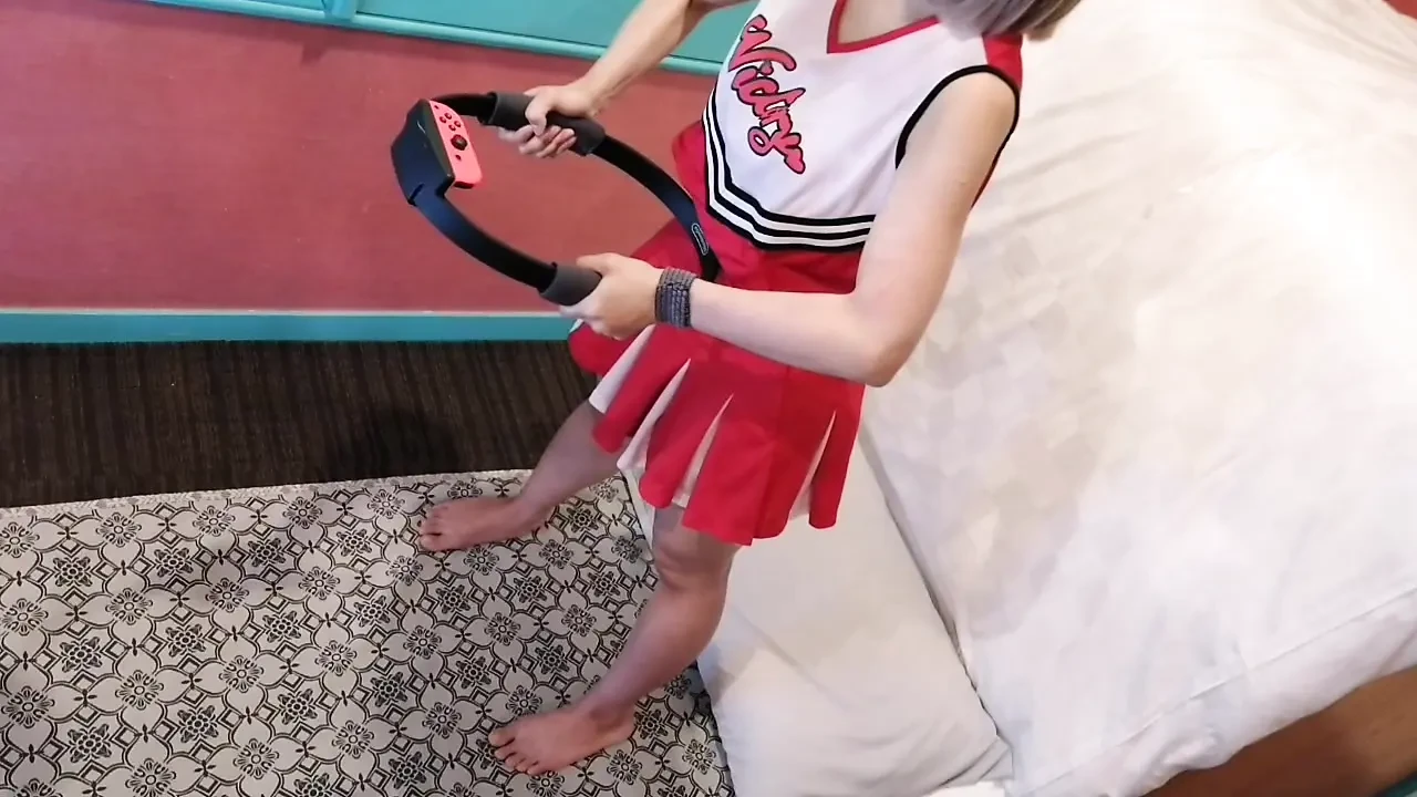 A cute, busty married woman does exercise 3 in a sexy cheerleader costume. Peeking down from above. Home made amateur Private Shoot