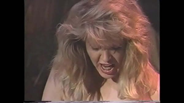 hot_blonde_80s_porn_queen_in_sexy_lingerie_has_strap-on_fuck_with_her_girlfriend